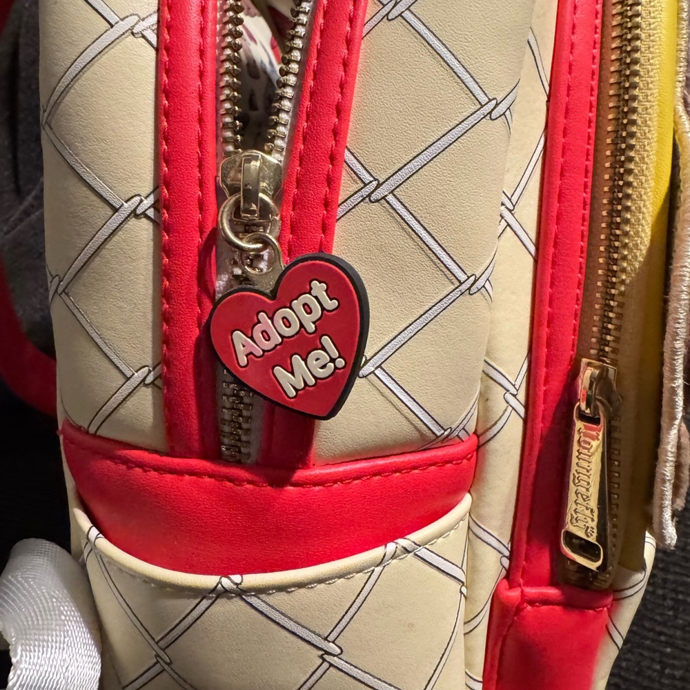 Loungefly Pound Puppies Yellow and Cream Backpack - Picture 11 of 11